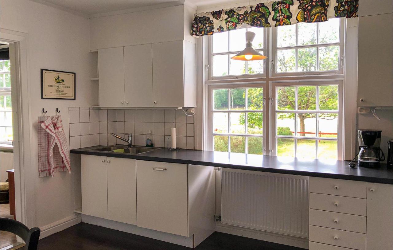 Nice Home In Mantorp With Kitchen Exterior photo